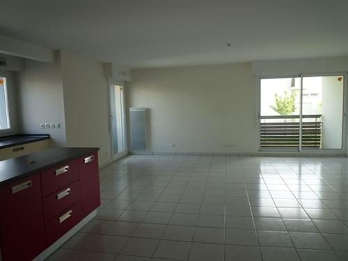 Bien: Appartement type 4 avec garage, parking et balcons